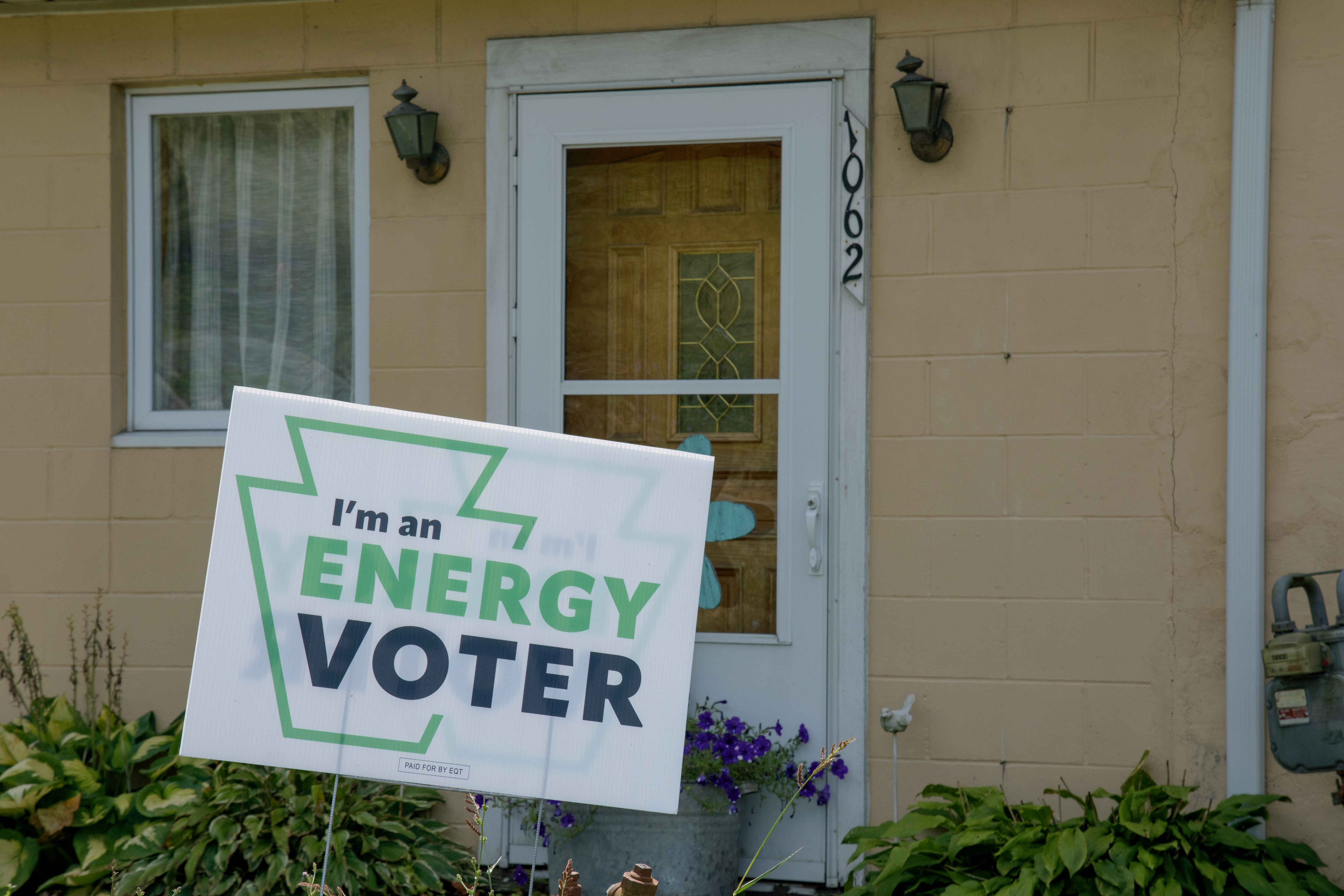 A sign in front of a home in Kirby—where the Cumberland Mine prep plant is located—reads “I’m an energy voter.” 